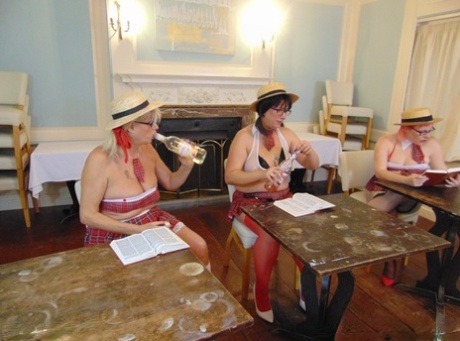 Amateur women engaging naughty sex acts while wearing schoolgirl attire