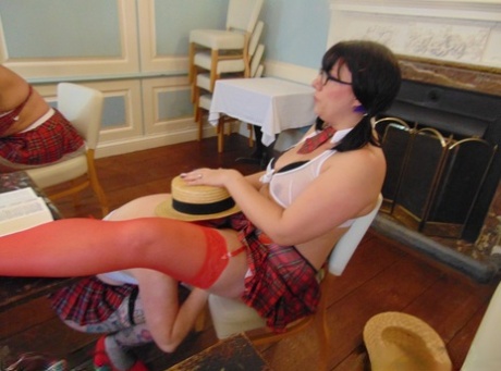 Amateur women engaging naughty sex acts while wearing schoolgirl attire