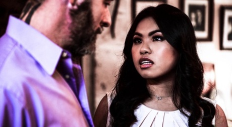 Asian girl Cindy Starfall has sex with a black man on a leather couch