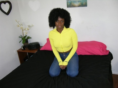 Black girl Kit K sports an afro while making her nude modelling debut