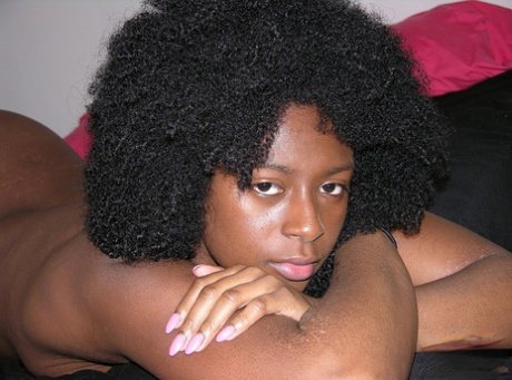 Black girl Kit K sports an afro while making her nude modelling debut