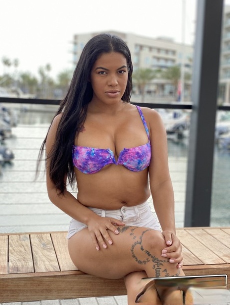 Latina chick Maya Farrell models at a marina before engaging in POV sex