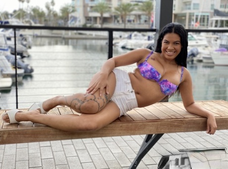 Latina chick Maya Farrell models at a marina before engaging in POV sex