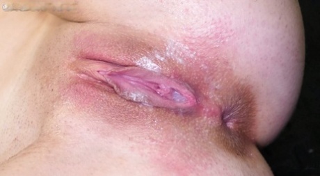 Blonde UK girl Evie Christian sports a creampie after an interracial gangbang