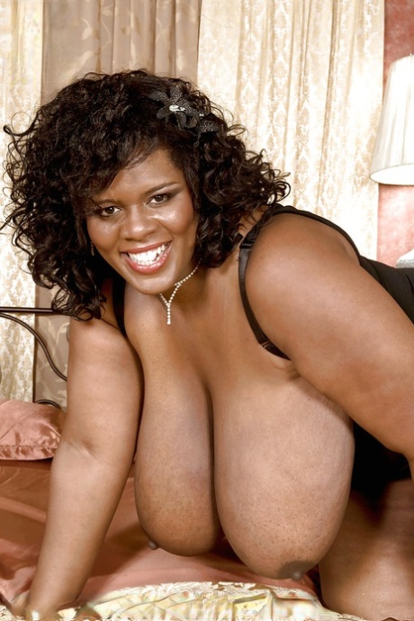 Busty black bbw Shar Nitzapanus almost loses her dildo between ginormous tits