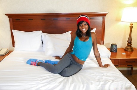 Undressing session features an Ebony teen babe in yoga pants Karma May