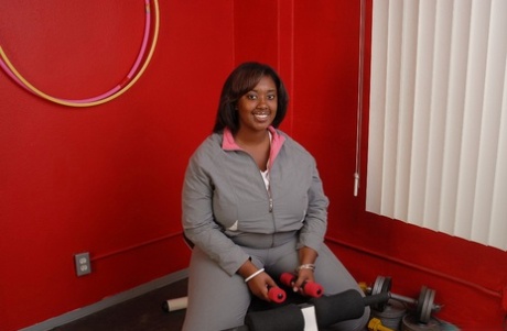 Fatty ebony Elite is undressing right after hardcore workout!