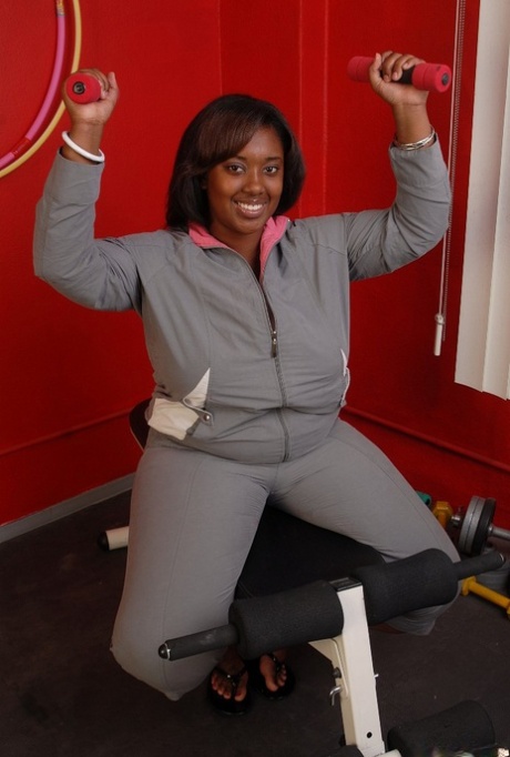 Fatty ebony Elite is undressing right after hardcore workout!