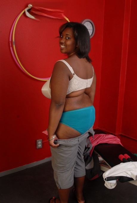 Fatty ebony Elite is undressing right after hardcore workout!