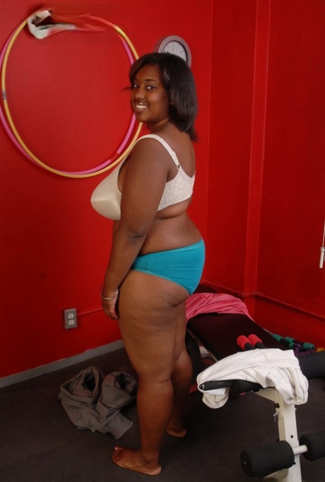 Fatty ebony Elite is undressing right after hardcore workout!