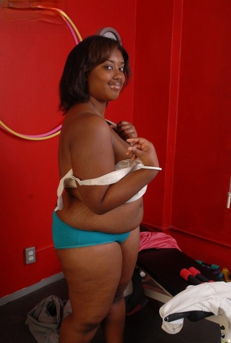 Fatty ebony Elite is undressing right after hardcore workout!