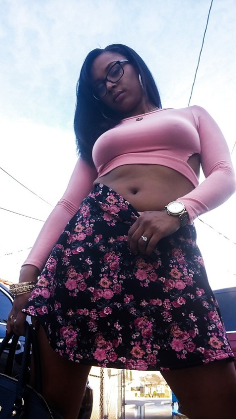 Busty ebony chick Porsha Carrera showing off her thong panties and phat ass