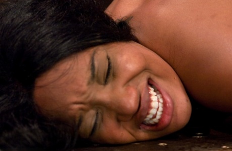 Ebony babe Kapri Styles endures rough doggystyle sex in metal bondage