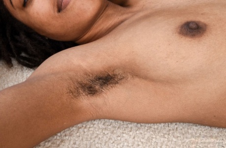 Hairy black amateur Olivia Green parts her pussy with her fingers
