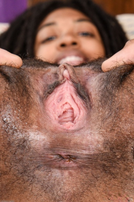 Hairy black amateur Olivia Green parts her pussy with her fingers