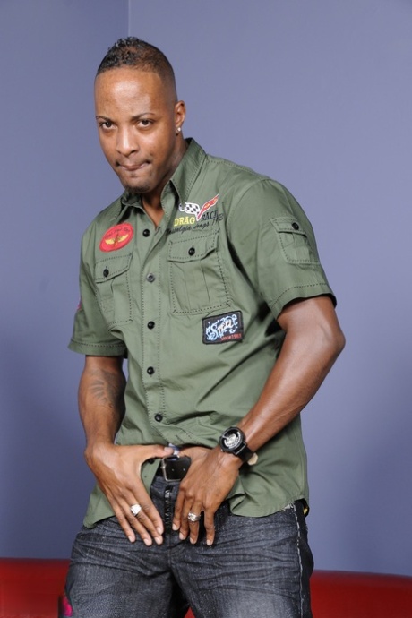 Ebony gay hottie Dru Blake goes topless and shows his sexy lean upper body