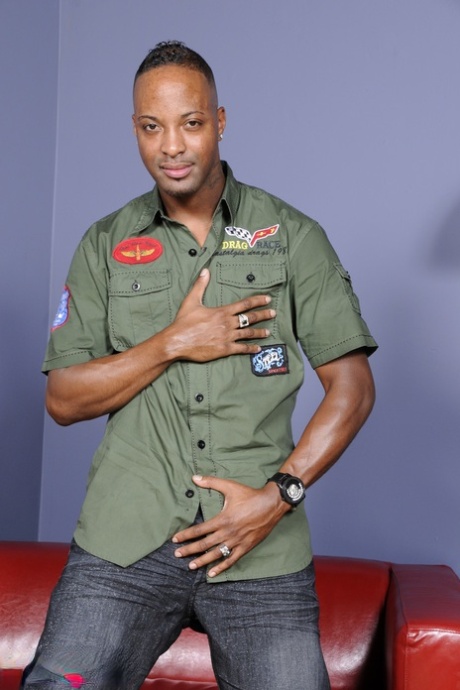 Ebony gay hottie Dru Blake goes topless and shows his sexy lean upper body