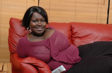 Afro-American BBW Mariana Kodjo goes topless and reveals her giant boobs