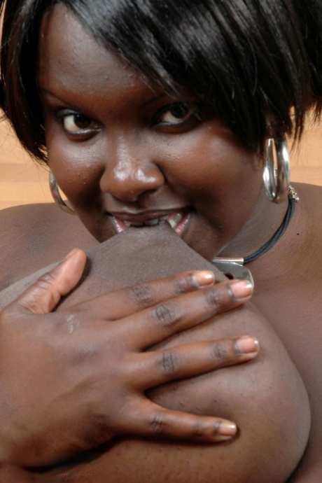 Afro-American BBW Mariana Kodjo goes topless and reveals her giant boobs
