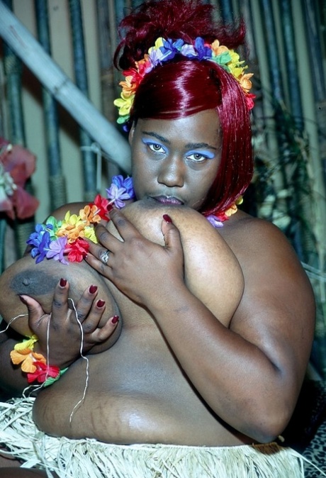 Fat ebony redhead Whitney Mayes sucks her big tits before riding a BBC