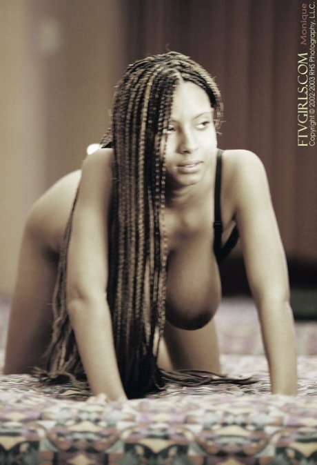 Gorgeous ebony babe Monique shows off her big tits & spreads her hairy cunt